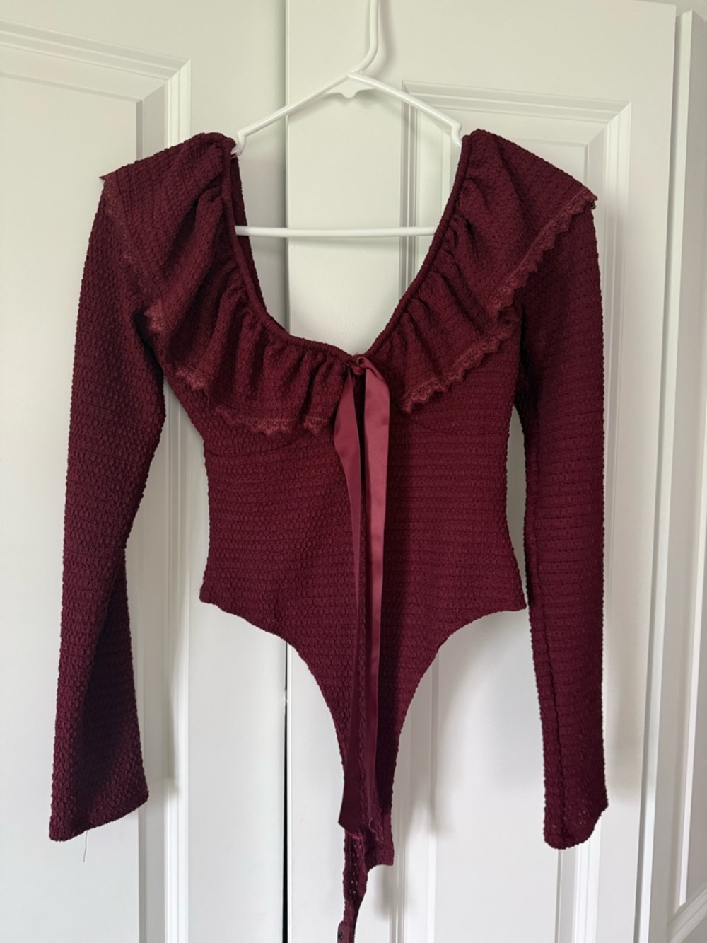 Maroon body suit
